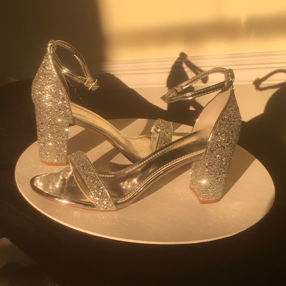 Ladies silver heels. Would be great for prom.